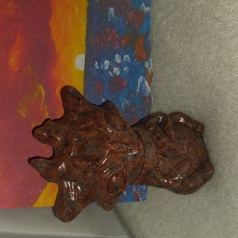 Alien Cat Princess Mononoke like creature sculpture solid red obsidian